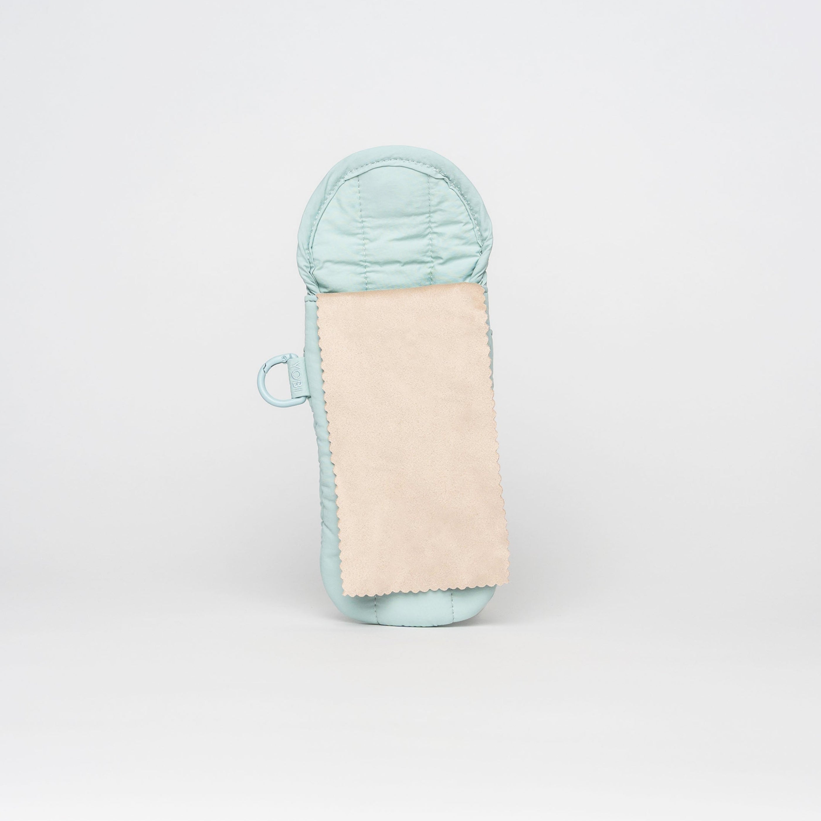 A light blue quilted pouch with a beige fabric insert, shown against a plain light gray background.