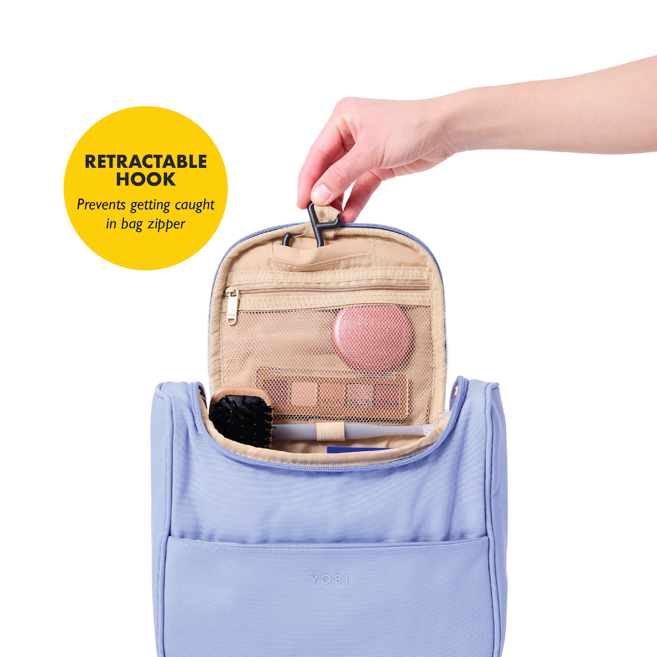 Spacious toiletry case with a retractable hook to prevent getting caught in bag zipper.